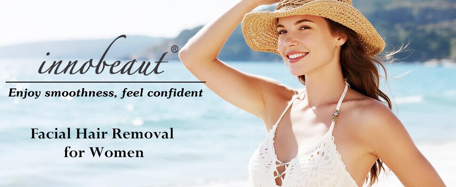 Woman smiling on the beach wearing a straw hat, promoting INNOBEAUT facial hair removal for women with the slogan “Enjoy smoothness, feel confident.